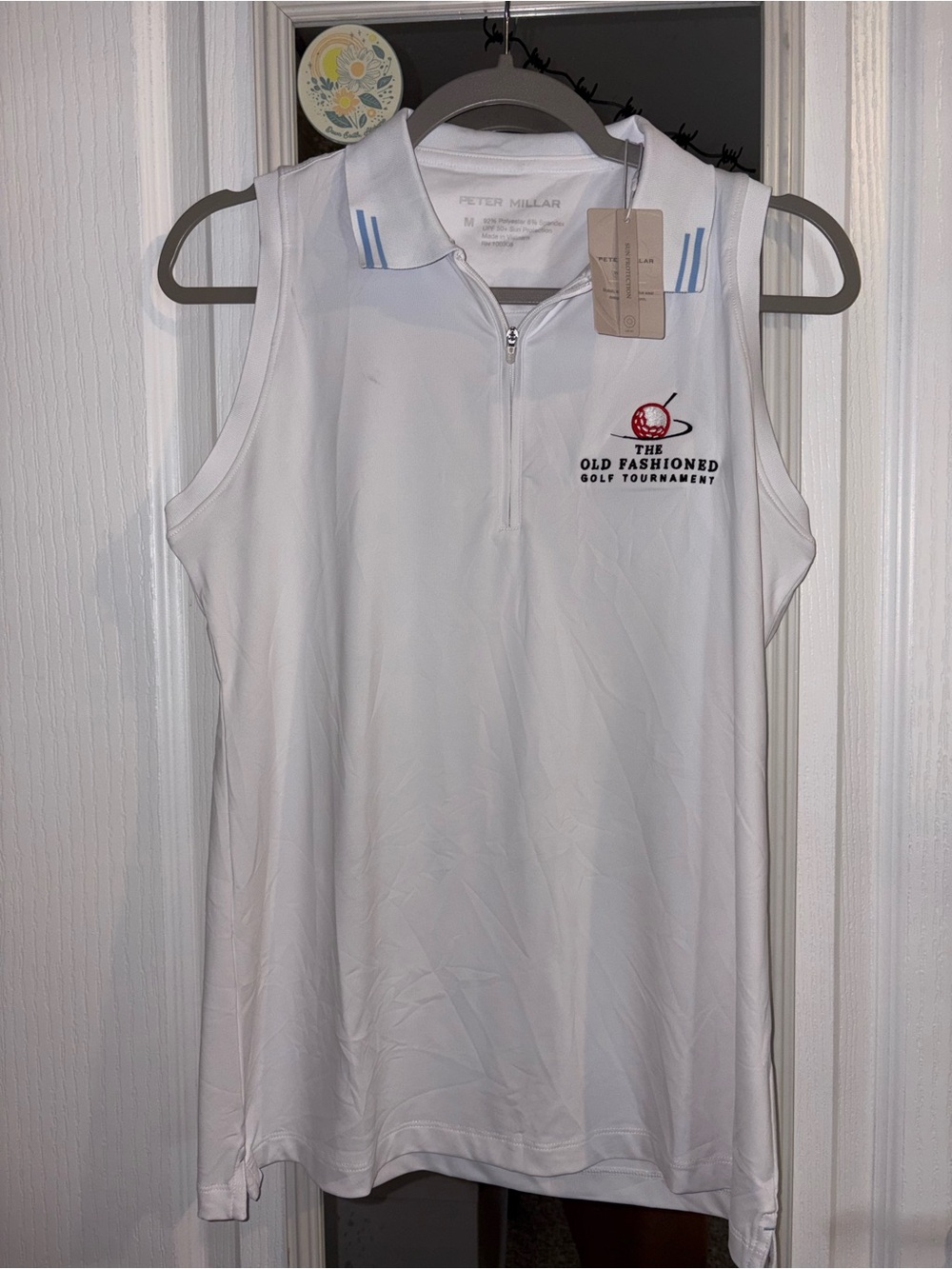 Peter Millar White Sleeveless Golf Polo with Blue Collar Stripes and Red Logo